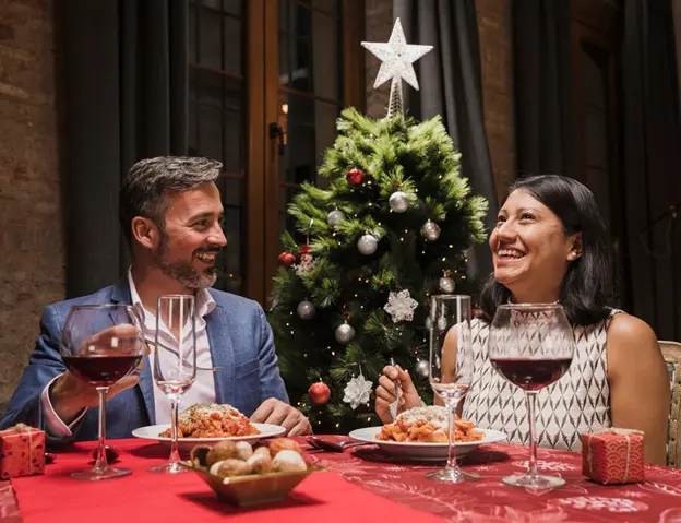 Man and woman having Christmas dinner at a restaurant