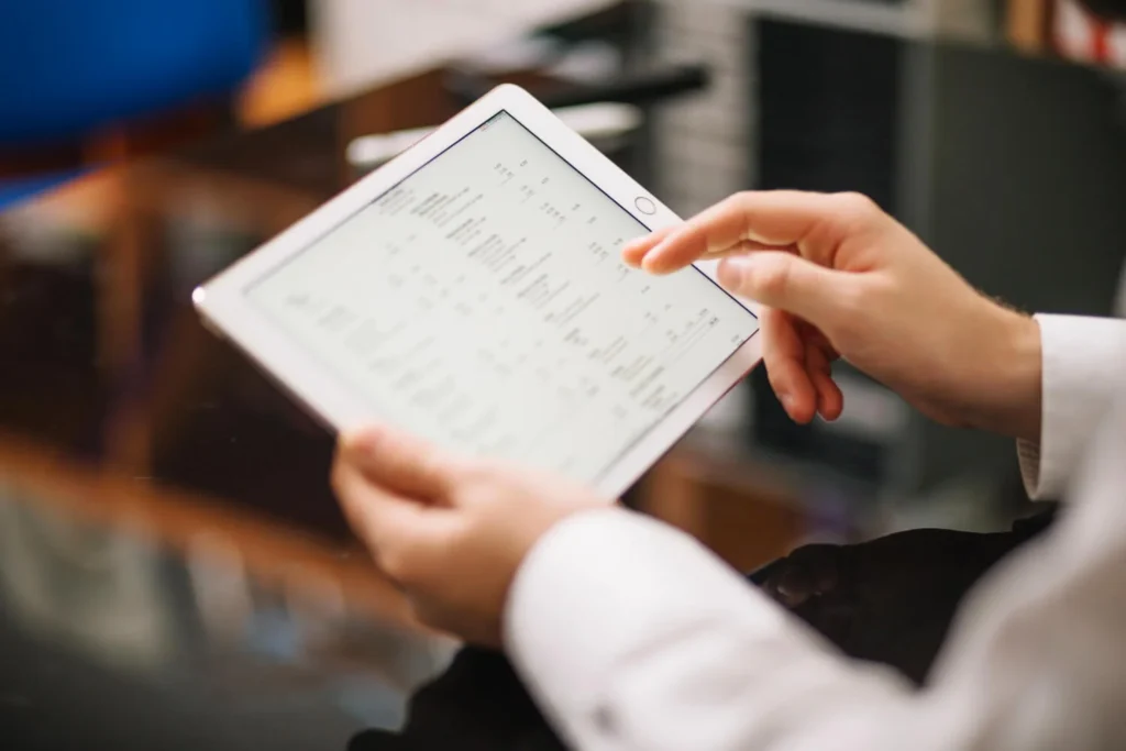 a person checking a menu as part of a restaurant inventory management system